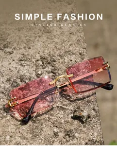 Damen rückenlose Mode-Sonnenbrille mit rosa Farbverlauf Kristall-Gläsern und goldenen Bügeln.