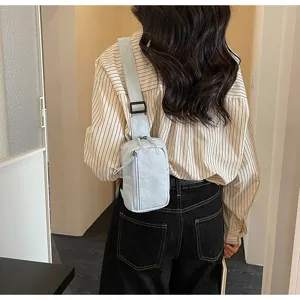Light blue casual chest bag detail, trendy crossbody shoulder bag for daily travel and sports.