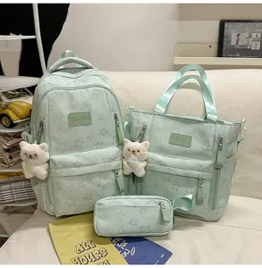 Cute mint green star backpack set with tote bag and pencil case, perfect for school students.