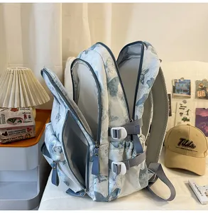 Exquisiter Cartoon-Schmetterlingsdruck, großer Kapazität Studenten-Rucksack mit Reißverschlussfächern.