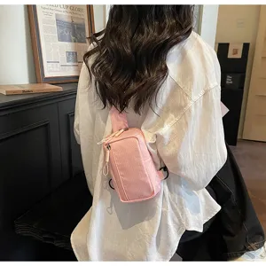 Pink grid chest bag, stylish Korean style crossbody waist bag for women traveling daily.
