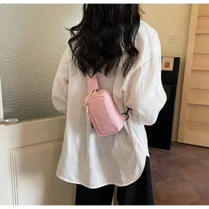Casual pink plaid chest bag, stylish crossbody travel phone bag for women daily use.