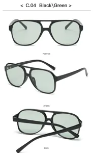 Lunettes de soleil vintage à double pont avec verres verts et monture noire tendance.
