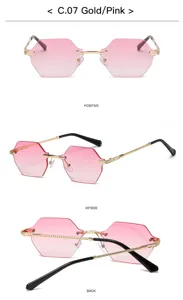 Gold metal rimless polygon sunglasses with pink gradient lenses, vintage fashion eyewear style.