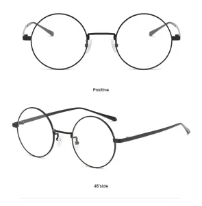 Elegantes gafas redondas de metal negro con diseño retro para uso diario y miopía.