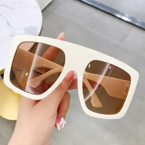 Oversized white frame sunglasses with brown lenses, stylish fashion sun glasses for women and men.