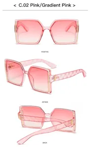 Vista detallada de gafas de sol extragrandes degradadas en rosa con detalles metálicos.