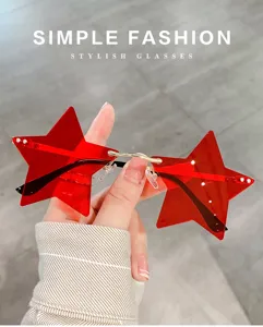 Detailed shot of trendy red star-shaped rimless sunglasses featuring unique creative design.
