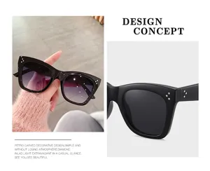 Gafas de sol cat-eye negras clásicas con lentes degradadas y detalles de remaches de metal.