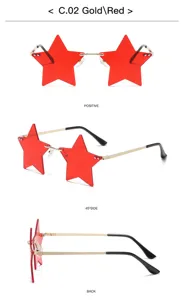 Detail view of stylish star-shaped rimless sunglasses with red lenses and gold frames.