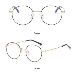 Detailansicht stilvoller runder Metall-Blaulichtfilter-Brille mit schwarzem und goldnem Rahmen.