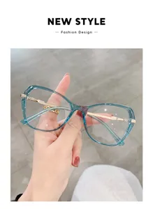 Monture de lunettes anti-lumière bleue élégante pour femmes avec cadre bleu et branches dorées.