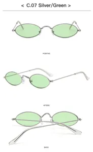 Metal kleine ovale zonnebril met groene lenzen, retro steampunk hip hop stijl detailweergave.