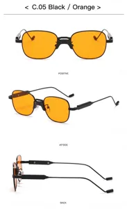 Lunettes de soleil carrées vintage à double pont, monture métal noire et verres orange.