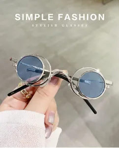 Gafas de sol redondas plegables únicas con doble montura y lentes azules de moda.