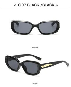 Lunettes de soleil carrées noires pour femmes, détails en métal doré chic, verres gris stylés.
