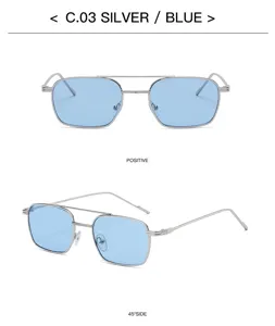 Detail view of metal double bridge sunglasses, silver frame with stylish light blue lenses.