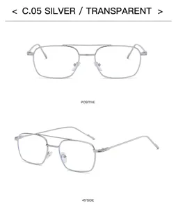Detail view of stylish silver metal double bridge glasses, transparent lens, chic narrow frame.