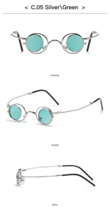 Gafas de sol redondas plegables retro con lentes verdes y montura de metal elegante.