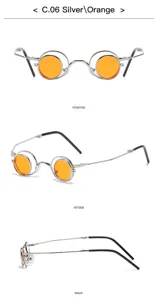 Gafas de sol redondas y plegables con lentes dobles naranjas y montura de metal plateado.