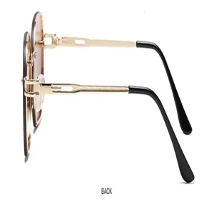 Lunettes de soleil sans monture dégradées tendance pour femmes avec branches en métal.