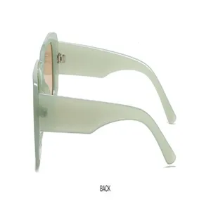 Green frame sunglasses side view detail showing sleek acetate design and fashionable look.