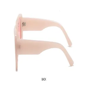 Detailed view of trendy light pink thick frame sunglasses, stylish side profile design.