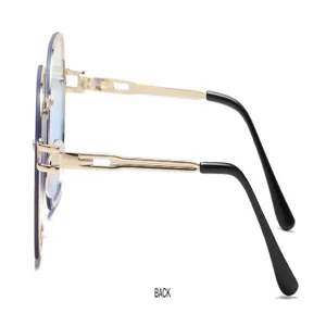 Vue laterale de lunettes de soleil sans monture degradees avec cadres creux en metal.