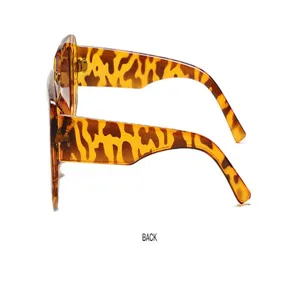 Detailed side view of tortoise shell square frame sunglasses, stylish retro design.