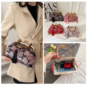 Vintage chinesische Blumenstickerei Abendtasche mit Bambusgriff und eleganter Metallkette.