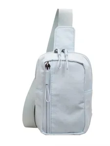 Light blue grid sling bag for women, stylish cross-body sports travel chest bag, casual use.