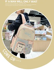 Large capacity school backpack with clear ita bag window and cute cat doll for students.
