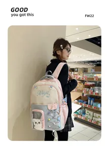 Cute colorblock school backpack with transparent ita bag pocket, large capacity for students.