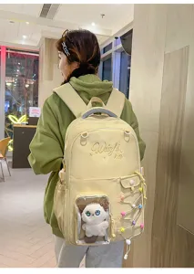 Large capacity canvas school backpack with cute embroidery and transparent ita bag window.
