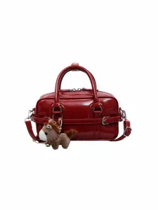 Red PU patent leather small handbag with cute horse charm, elegant shoulder bag for women.