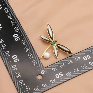 Gold plated dragonfly brooch with pearl green zircon and black wing for elegant women