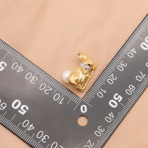 Gold plated pearl rabbit brooch, cute animal lapel pin with sparkling crystal collar.