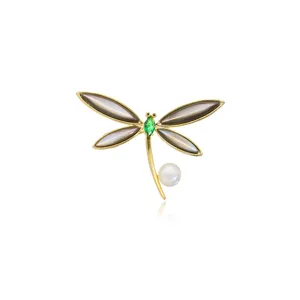 18k gold plated micro-inlaid zirconia dragonfly brooch with pearl and black mother of pearl.