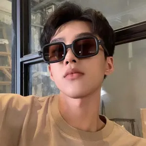 Men's fashion square sunglasses with thick black frames and retro street style design.