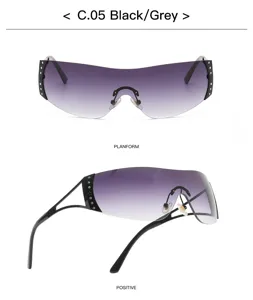 Y2K futuristic sunglasses detail view, gradient grey lenses with star rhinestone accents.