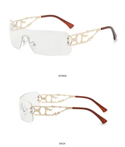 Detailansicht der Y2K rahmenlosen Sonnenbrille mit goldenen Bügeln und klaren Gläsern.