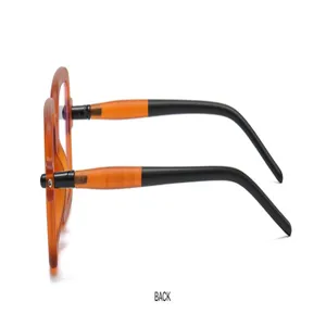 Side view detail of retro square thick frame sunglasses with amber and black color.