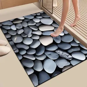 Pebble diatomaceous earth bath mat absorbent non-slip floor mat for home bathroom use.