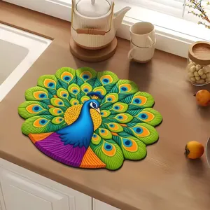 Detailed view of a peacock shaped diatomaceous earth dish drying mat on wooden kitchen counter.