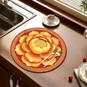 Detailed view of the red lotus diatomaceous earth placemat and countertop drain mat setup.