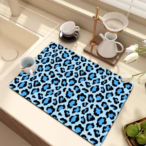 Blue leopard print kitchen drying mat detail, silicone diatomaceous earth countertop placemat view.