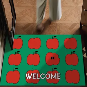 Cartoon red apple pattern diatomite floor mat detail view, absorbent entrance doormat.
