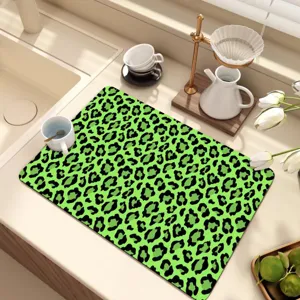 Neon green leopard print dish drying mat for kitchen countertop, absorbent and non-slip.