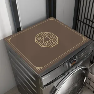 Detail shot of the brown Chinese style washing machine cover mat with golden traditional pattern.