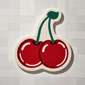 Cute cherry shaped tufted rug detail view, soft plush material for room bedroom decor.